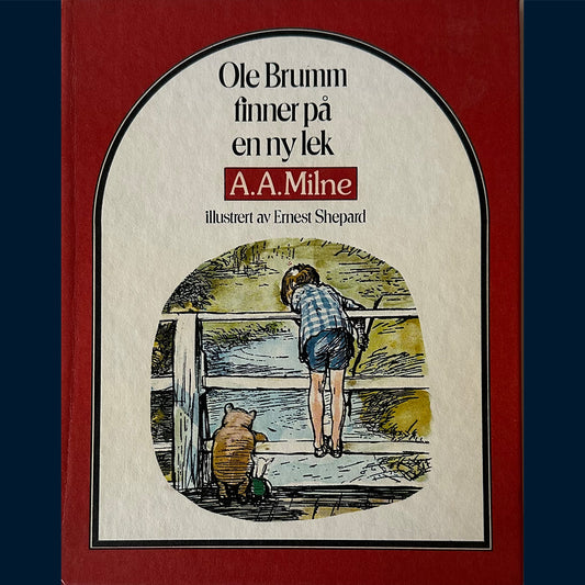 Milne, A.A.: Ole Brumm finner på en ny lek